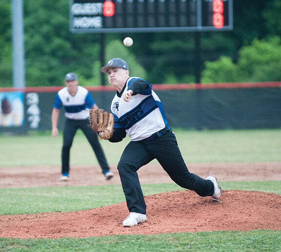 5-31 phelps Caleb Dotson pitching.jpg